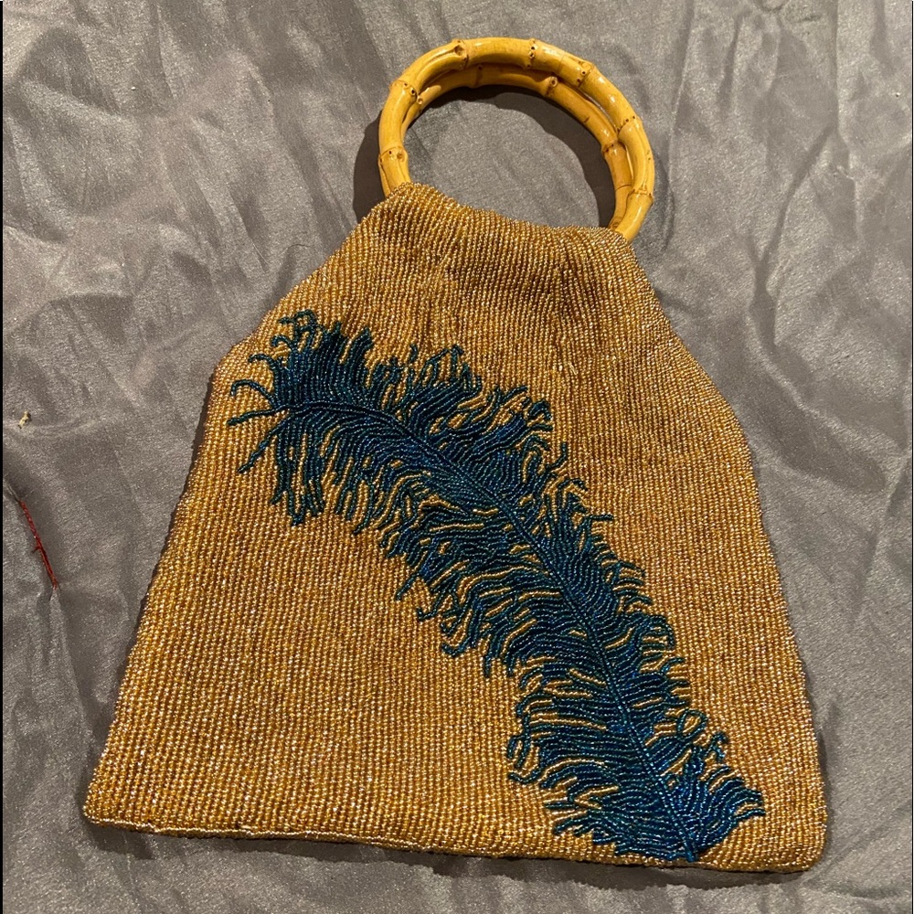 BCBGMAXAZRIA beaded handbag with bamboo handles